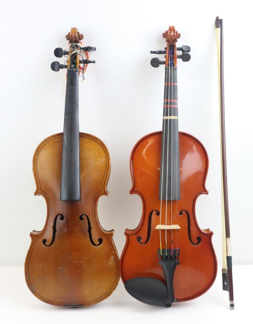 Lot of 2 Violins: Both 1/2 Size. Student No Label in Good Used Condition with Dominant D and G Strings, Horsehair Bow and Molded Case. Conservatory "Magigini" copy. Body Appears Intact. Soundpost is Up Needs Set-up. So
