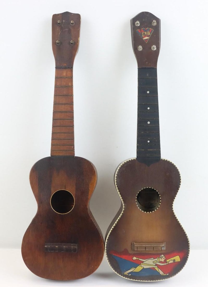 Lot of 2 Ukuleles: Lot of 2 Ukuleles Needing Repair. #1 Princess Brand.with Original Pegs. #2, Supertone c.1930 with "Cheerleader" Graphics. Original Pegs