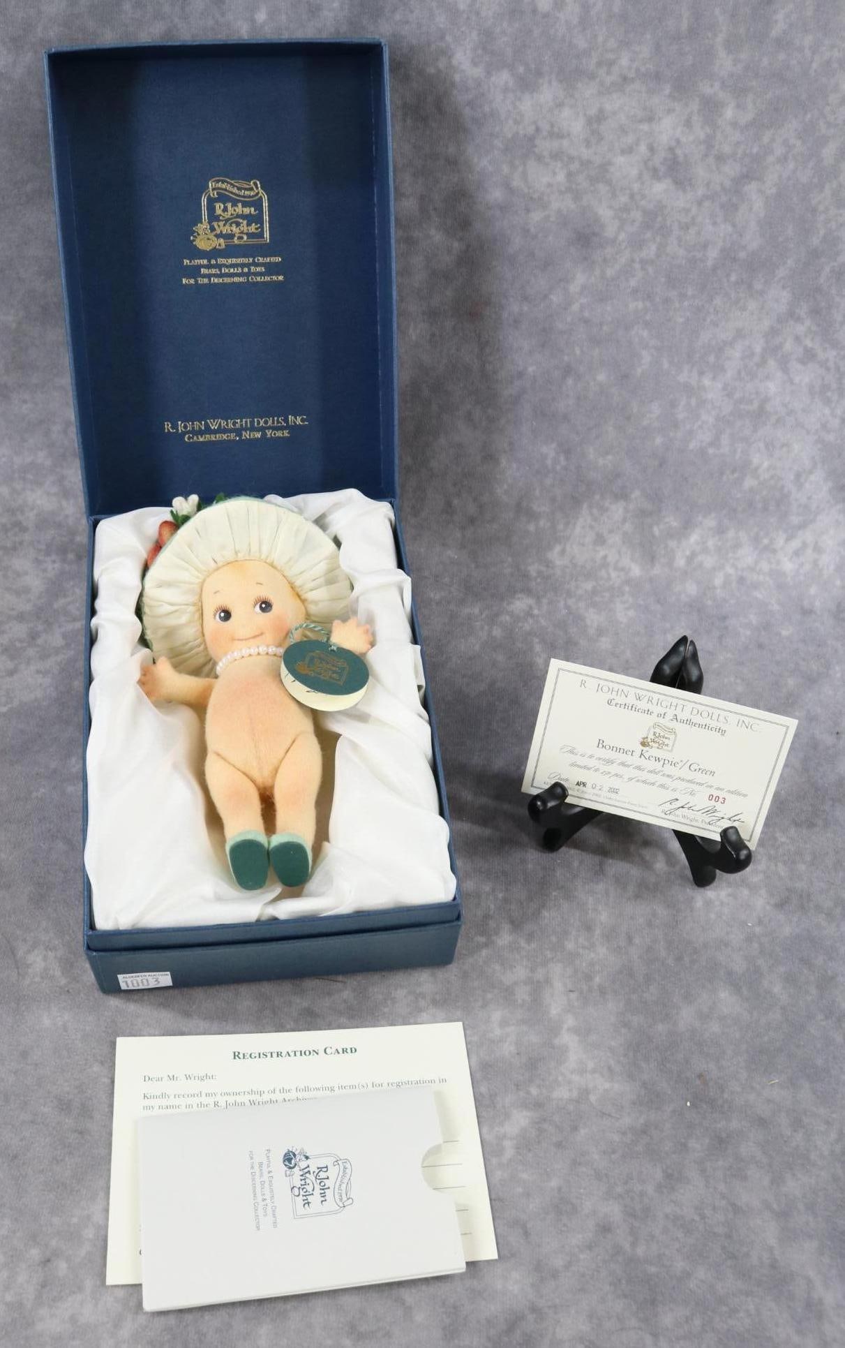 R. JOHN WRIGHT.: 6 1/2" MIB 2002 "BONNET KEWPIE" Green. Ltd. Ed. No 003/250. COA. Hang tag on wrist is signed: Best Wishes, R. John Wright, 2005