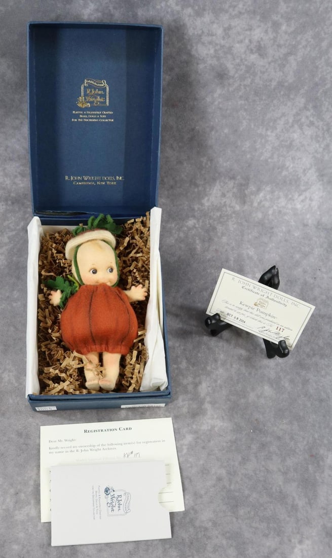 R. JOHN WRIGHT.: 6 1/2" 2004 "KEWPIE PUMPKIN" Halloween Kewpie. Ltd. Ed. 117/250. COA. Condition: Kewpie is MINT. Box has loss on inside lid. This lot is being sold AS IS.
