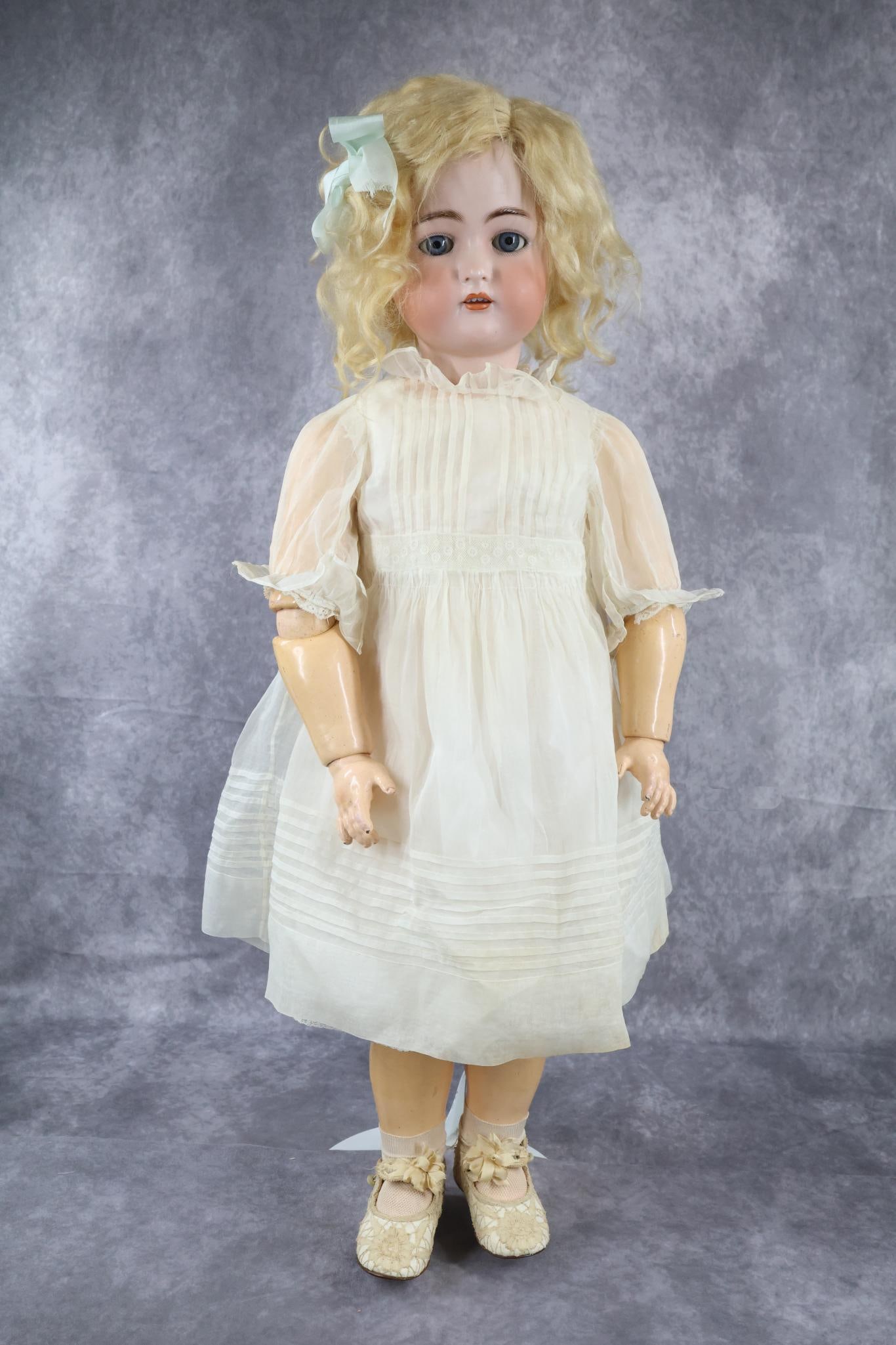 ANTIQUE GERMAN BISQUE HEAD DOLL(S). (1 of 6)
