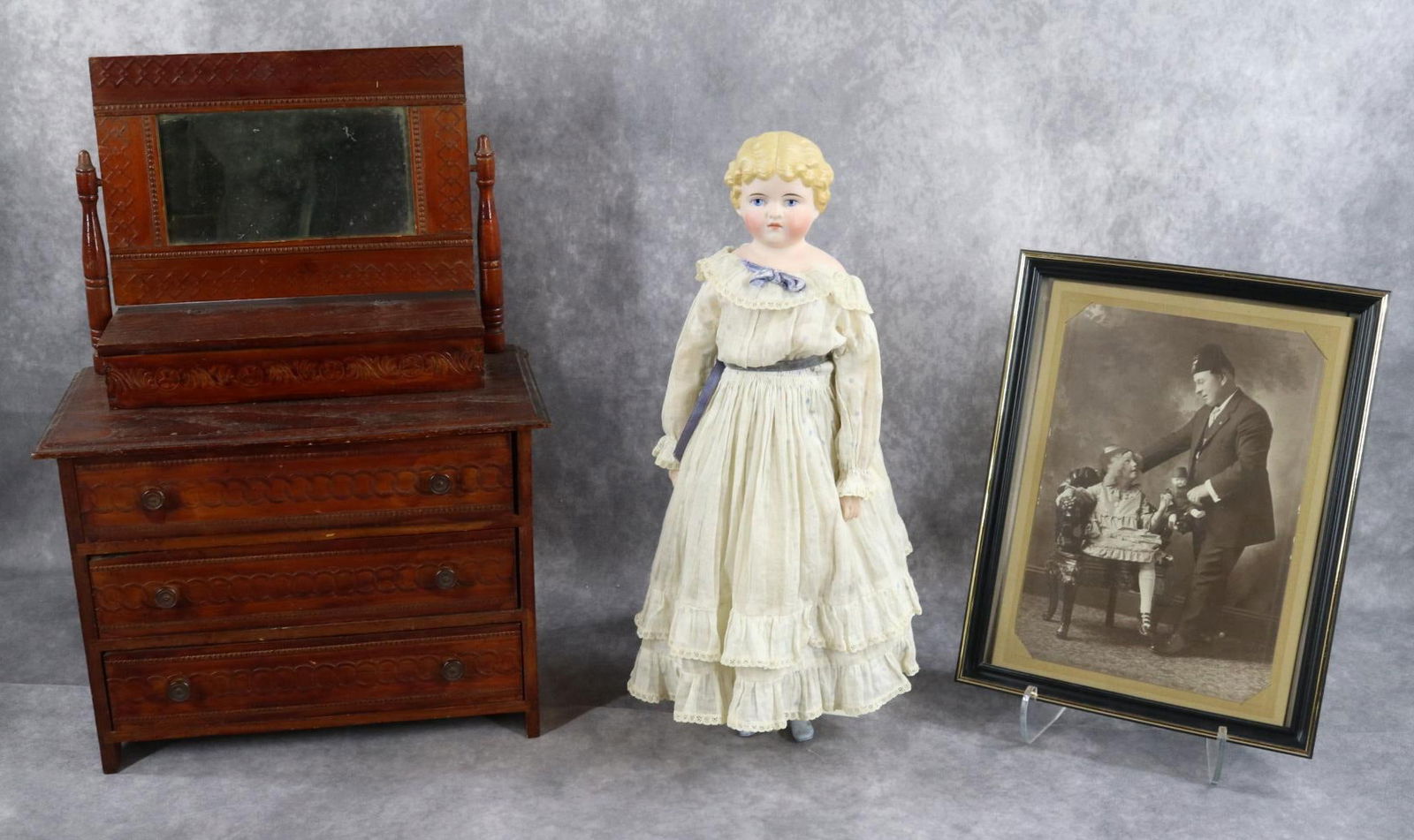 GERMAN BISQUE.: LOT. Doll - 16" 189 4 Shoulder head doll with molded painted blonde hair, blue eyes, closed mouth. Cloth body with bisque lower arms and legs with painted blue boots, white stockings. Dressed in antiq