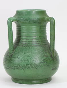 Wheatley Pottery Vase: Arts and Crafts pottery vase with three handles and ribbed neck, in a matte green glaze, with impressed "WP" mark to the foot. Professional restoration to the handle and a drill hole; some glaze