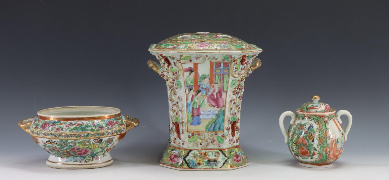 Chinese Famille Rose Porcelain Wares: Qing era tablewares with complementing decoration. A Rose Mandarin censer with pierced cover, and handles, decorated with figures in court scenes, butterflies and other insects, flowers and fruit, wit