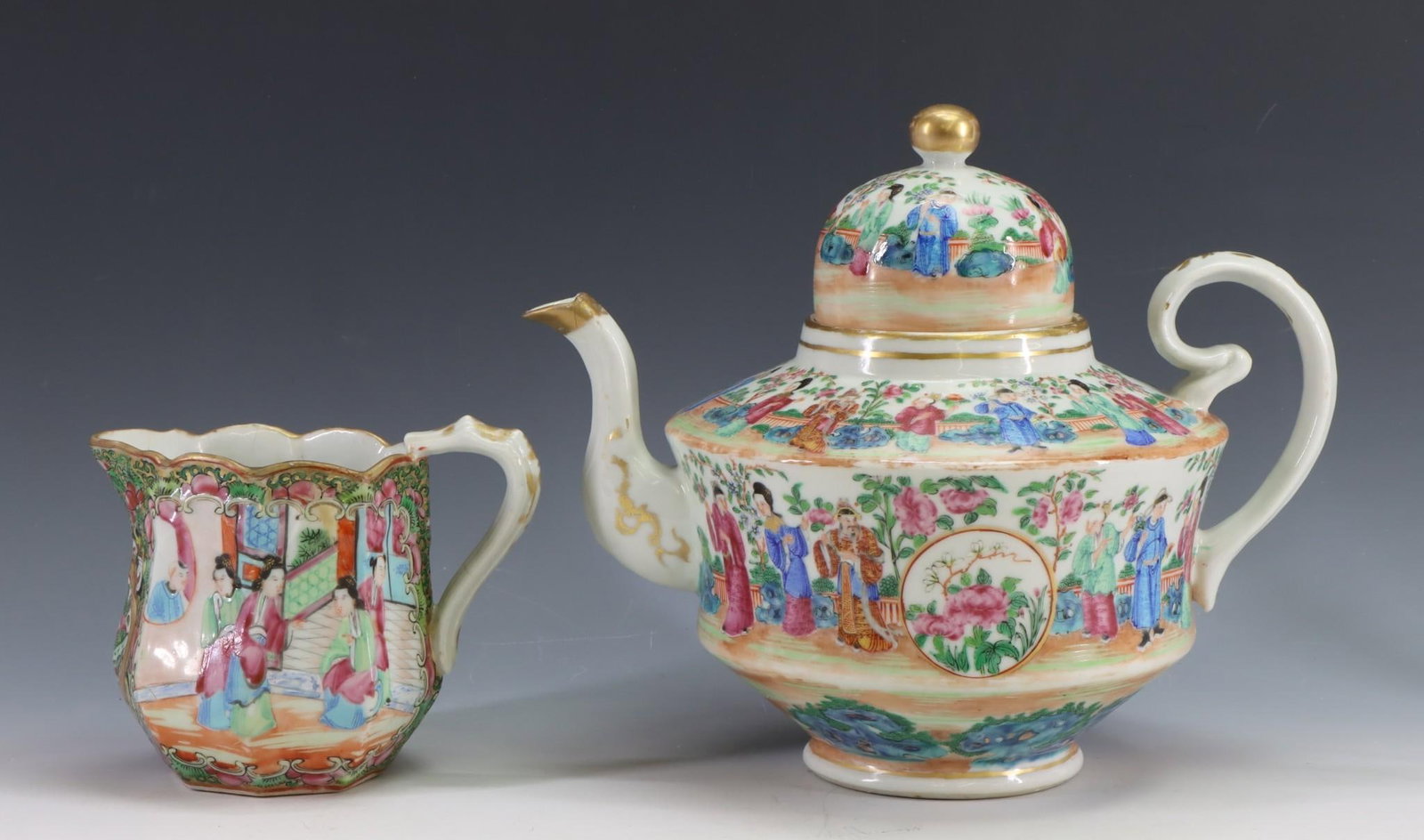 Chinese Famille Rose Porcelain Teawares: Qing era pieces, including a Famille Mandarin teapot decorated with figures in a garden setting, and a Rose Medallion creamer decorated with figures in court scenes, birds, butterflies, and flowers, w
