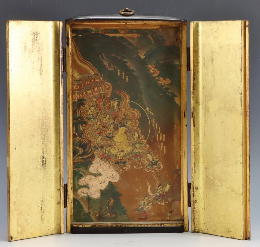 Japanese Zushi Traveling Shrine: Meiji era or earlier gilt embellished woodblock print on paper, a depiction of Amida Buddha descending from heaven with attendants, trimmed and laid down in a later lacquered and gilded shrine box. 10