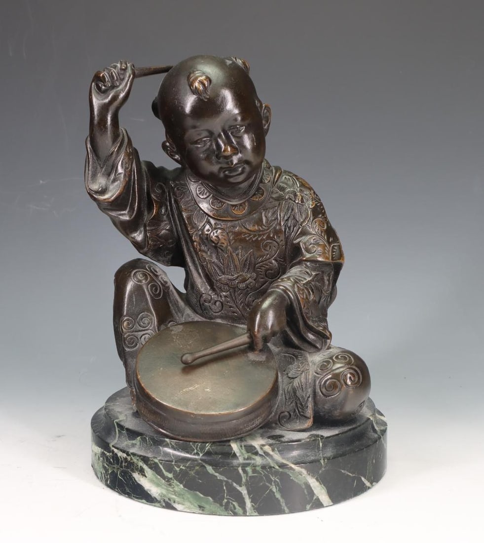 Japanese Bronze Sculpture: Meiji era, sculpture of a drummer boy, mounted to a later marble plinth. Manner of Miyao. 7.5"h x 5.5"w x 5.5"d, 8.5"h overall