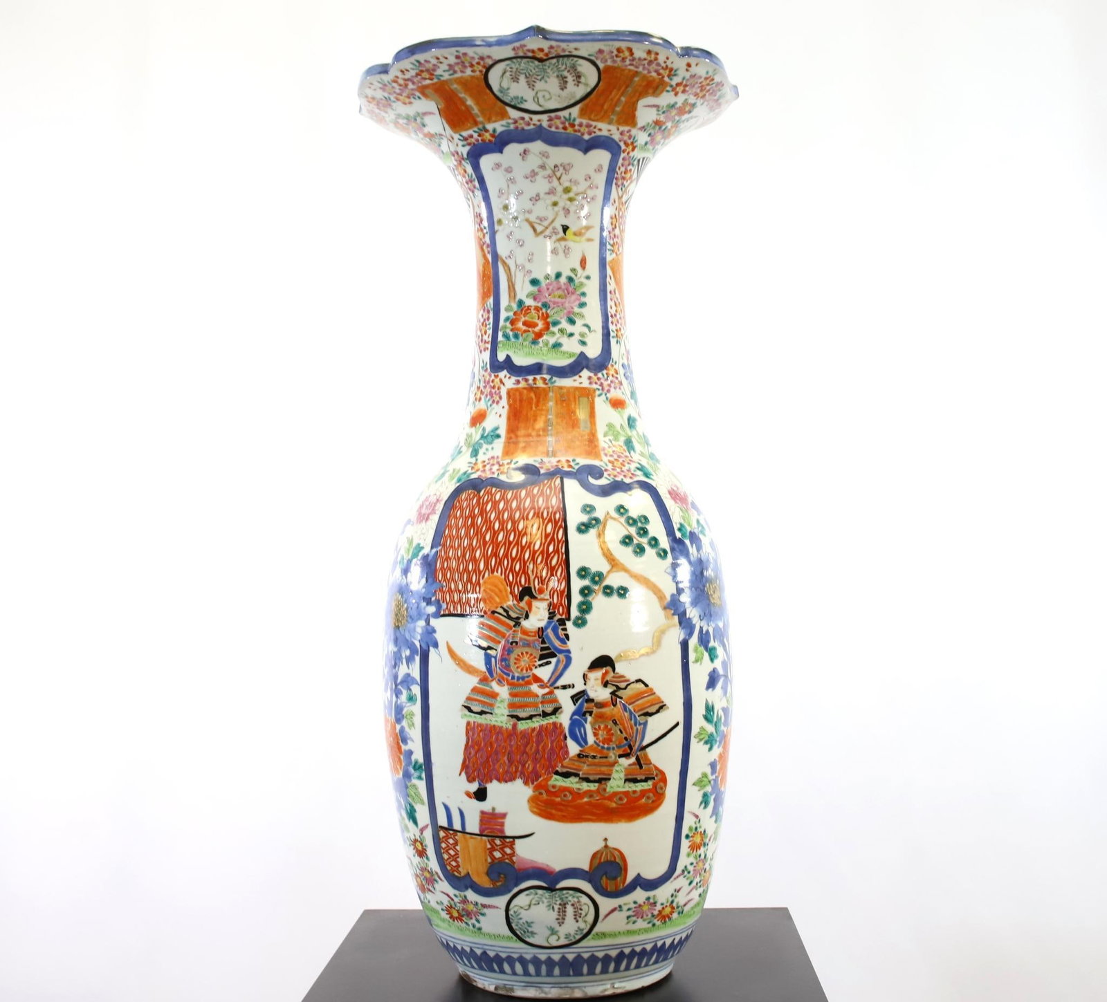 Meiji Imari Baluster Vase, Large Scale: Meiji Imari baluster vase in baluster form with flared rim, decorated with Samurai and floral motifs in Imari style. Professional restoration noted. 27.25"h x 12"dia