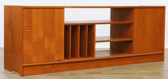 Feldballes Mobelfabrik Media Cabinet: Danish Modern teak media cabinet, featuring open fitted shelving, including a pull-out, flanked by cabinets which open to adjustable shelving, unmarked. Some loose veneer. 25"h x 69.5"w x 16.5"d