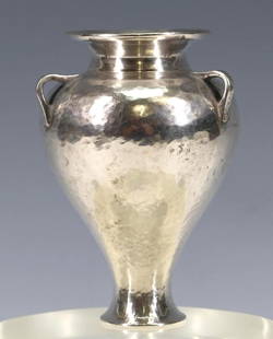 Lalaounis Sterling Silver Greek Vase: Greek sterling silver bud vase in the form of an amphora, with a hand hammered finish and handles, marked for Ilias Lalaounis. 3.75"h x 2.75"w, and 3.09 ozt
