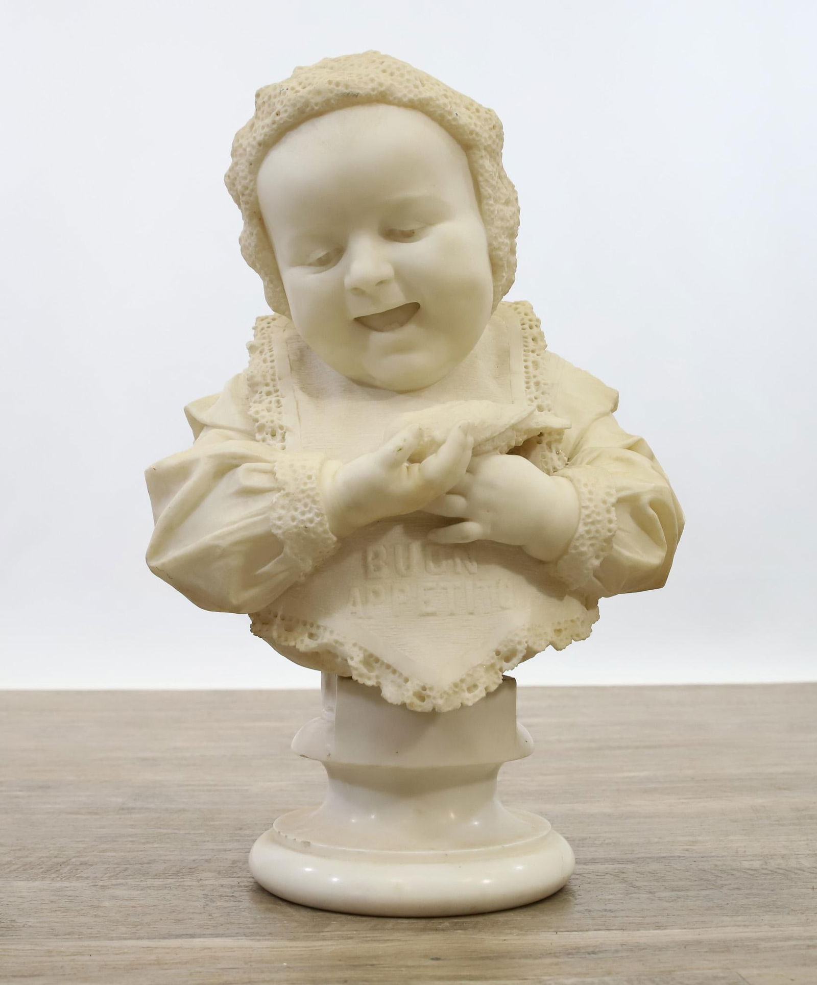 Italian Alabaster Bust: Carved alabaster sculpture of a young girl holding a bird, unsigned, resting on a removable plinth. Breaks/loss to the plinth. 20"h x 12"w x 8"d overall