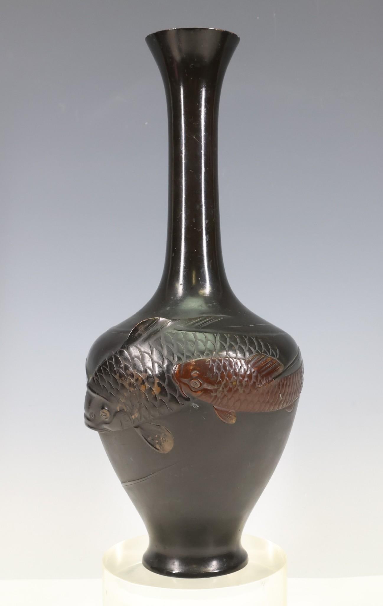 Japanese Bronze Vase: Late Meiji - Taisho era bottle vase with carp in relief in varying patinas. There is a push and some surface wear. 11.25"h
