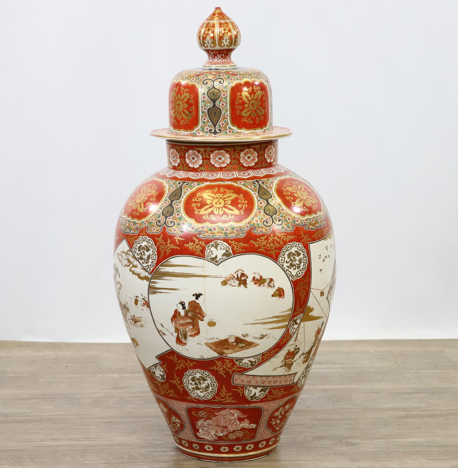Meiji Japanese Kutani Vase, Large Scale: Meiji Japanese Kutani vase with cover decorated with farming scenes and scenes of daily life. Signs of professional restoration throughout, and crazing throughout. 36.5"h x 16.5"w