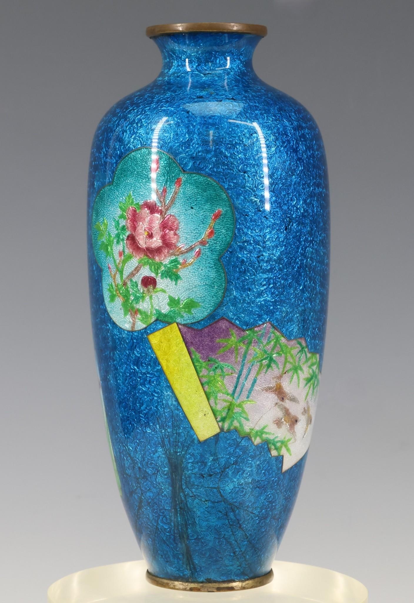 Japanese Ginbari Tsuiki-Jippo Cloisonne Vase: Meiji - Taisho era vase with fan form panels decorated with textured birds and flowers on a cerulean blue ground. Hairlines to the enameling. 7.25"h x 3"w