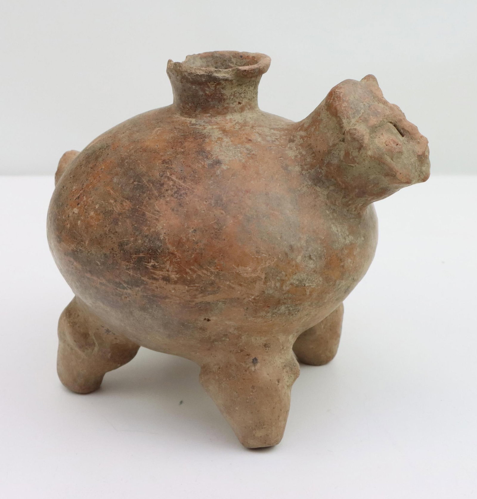 Pre-Columbian Pottery: Pre-Columbian earthenware, zoomorphic jaguar jar, purchased in Colombia c. 1982, 6.75"h.