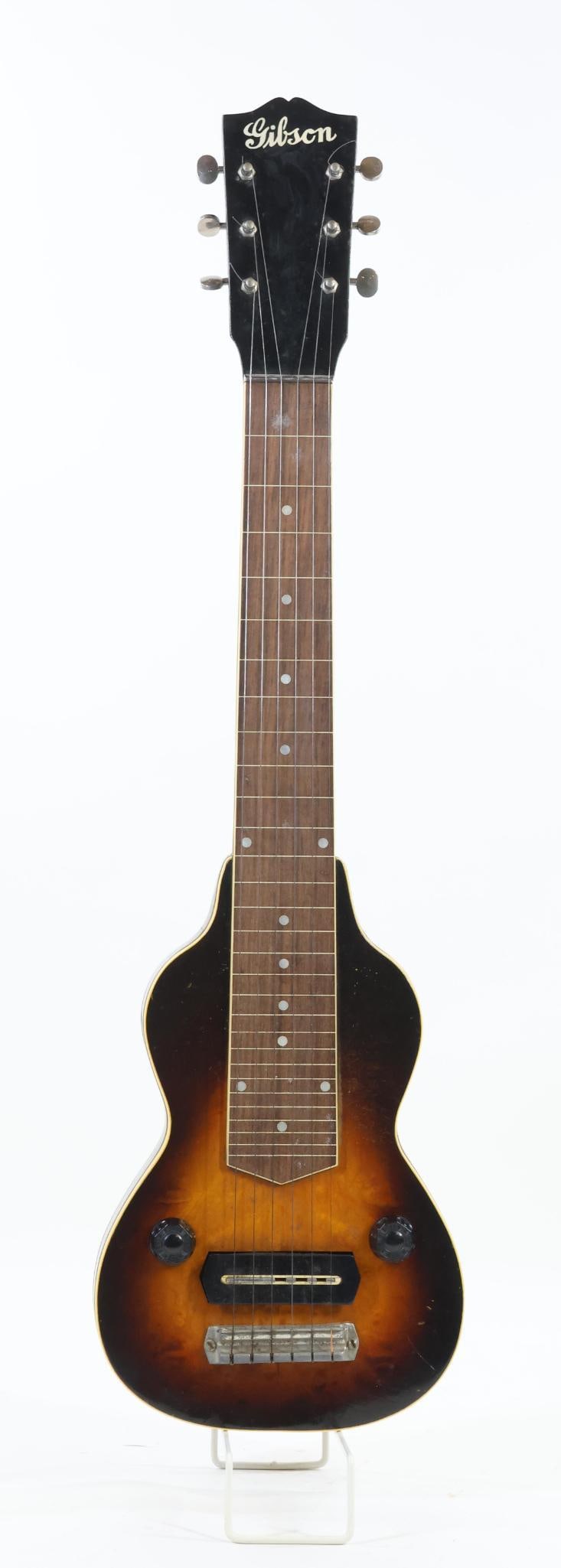Gibson Electric Hawaiian Guitar: Gibson Electric Hawaiian "Lap Steel" Guitar. Possibly Model EH150. Good Used Condition. Birdseye Maple Body, Bakelite Knobs, "Charlie Christian" Bar Magnet Pickup. Serial Number 432-14, c.1940. Instru