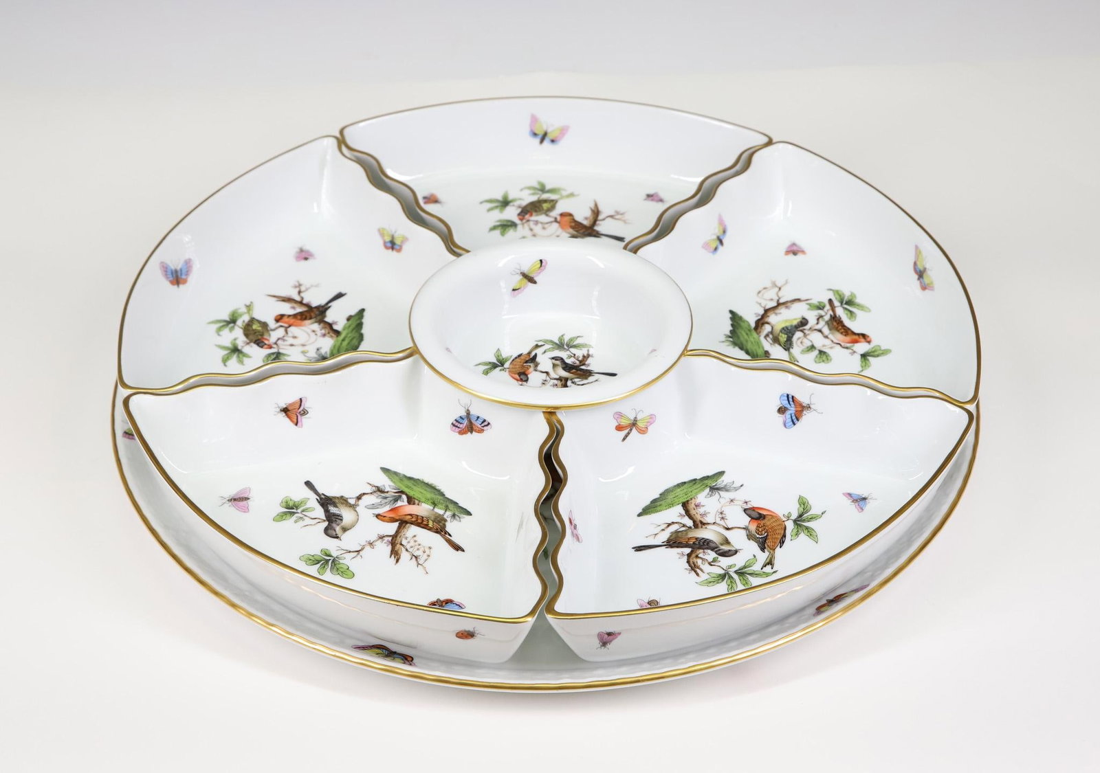 Herend "Rothschild Bird" Porcelain Hors d'Oeuvres Set: Herend porcelain segmented hors d'oeuvres set, including scalloped crescent pieces, a center bowl, and an underplate. All pieces show 1976 Jubilee marks. (7) pieces. 2"h x 15"w overall
