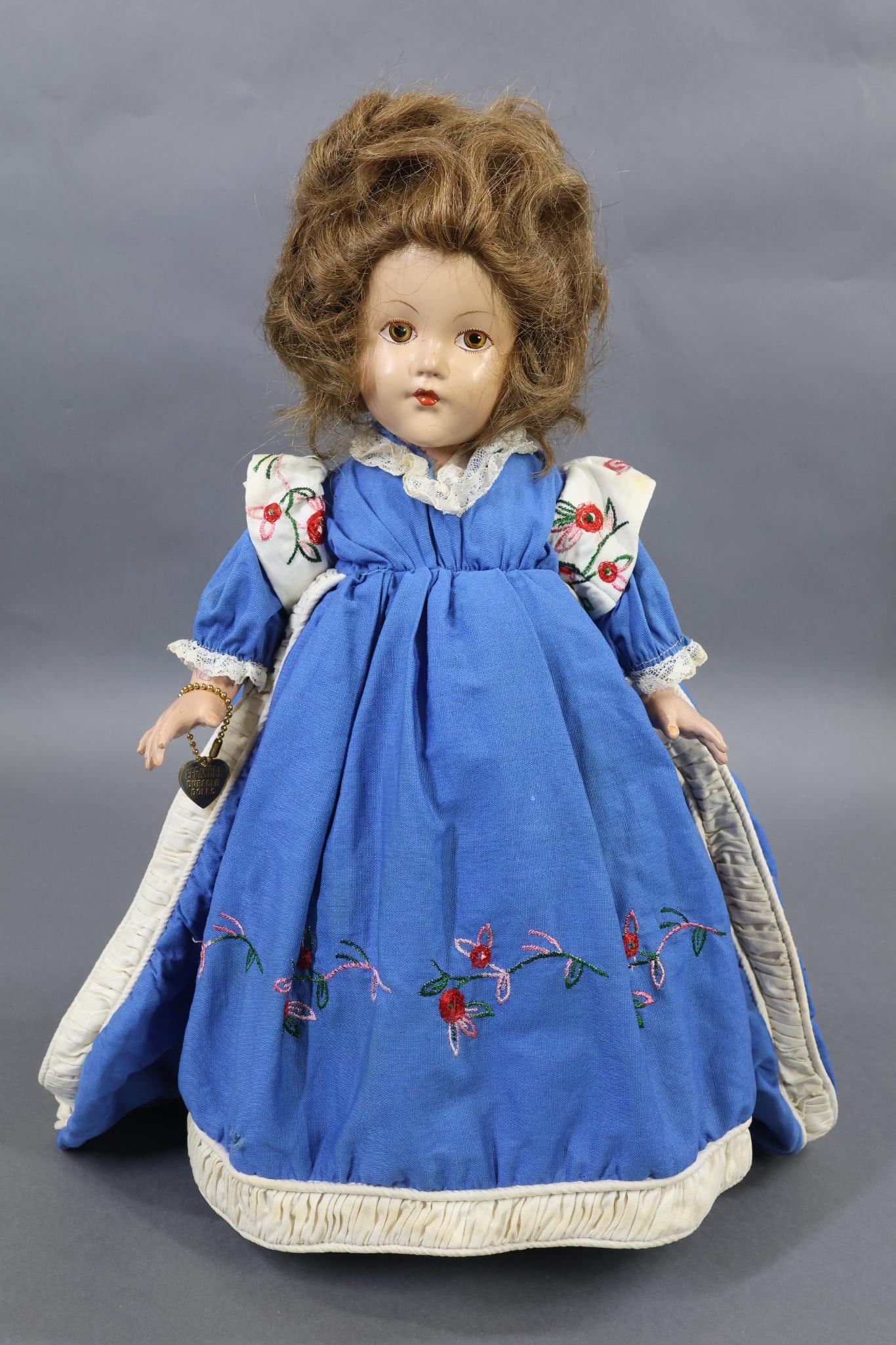 F & B HISTORICAL DOLLS.: EFFANBEE HISTORICAL DOLL. 14" 1939 Composition doll portraying "The Louisiana Purchase, 1804". Painted features, brown HH wig. All original clothing and shoes. Brass heart bracelet. Condition: light c