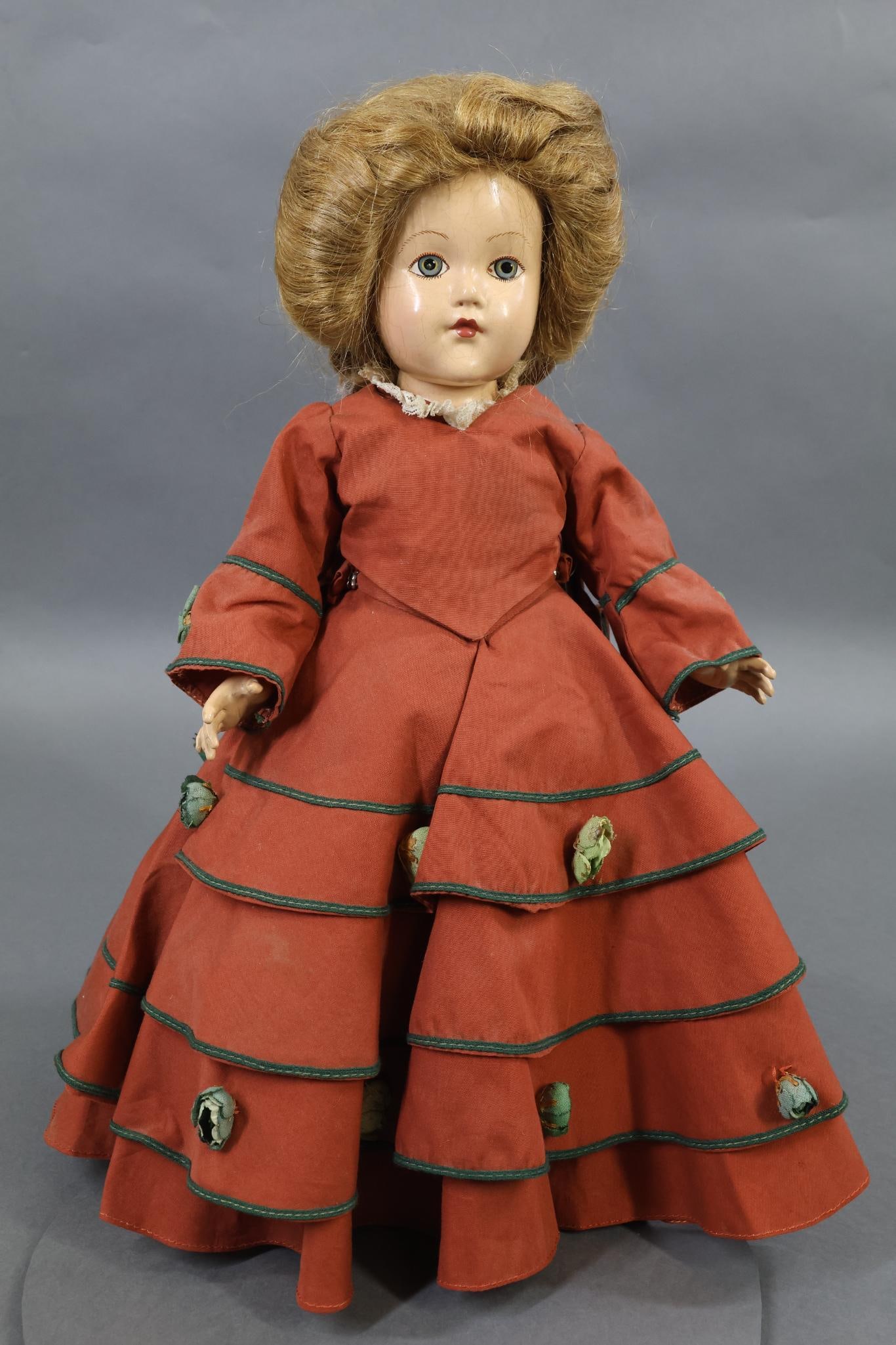 F & B HISTORICAL DOLLS.: EFFANBEE HISTORICAL DOLL. 14" 1939 Composition doll portraying "Economic Development, 1872". Painted features, brown HH wig. All original clothing and shoes. Condition: light crazing. This doll is bei