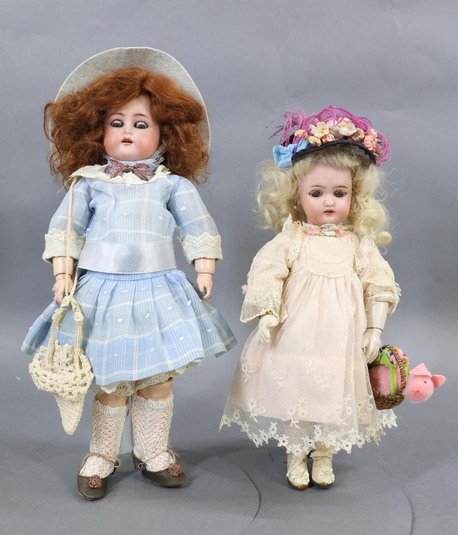 GERMAN BISQUE DOLLS.: Pair of GERMAN dolls. Both dolls have sleep eyes, open mouths, pierced ears, curly mohair wigs, papier mache jointed bodies. Doll 1) 10 1/2" 1079 GERMANY HALBIG S & H 2 1/2 with brown eyes, fluffy las