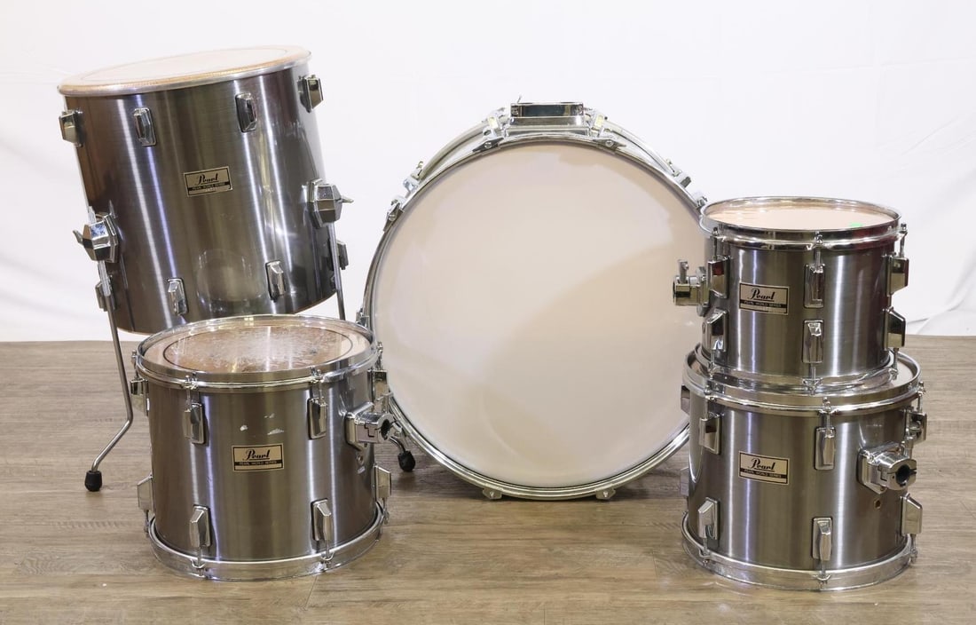 Pearl World Series Drums: Pearl "World" Series Drums Including: 10", 12", 13" Toms. 16" Floor Tom and 22" Bass. Maple Ply Shells. Bass Drum Tom Mounts. All Good Used Condition.