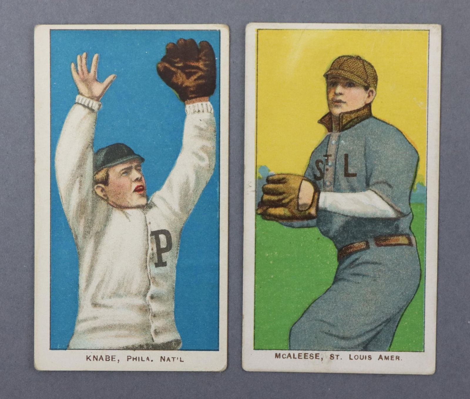 (2) 1909-11 T206 Piedmont Baseball Tobacco Cards: (2) 1909-11 T206 Piedmont White Border baseball tobacco cards: Otto Knabe & John Mcleese. The cards are free of creases. Both cards feature a Piedmont 350 Subjects ad back and a factory 25 caption.