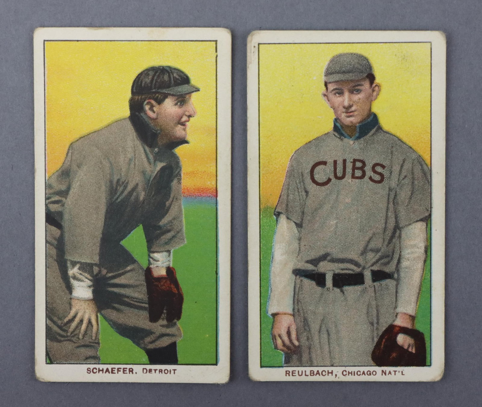 (2) 1909-11 T206 Piedmont Baseball Tobacco Cards: (2) 1909-11 T206 Piedmont White Border baseball tobacco cards: Germany Schaefer (Detroit variation) & Ed Reulbach (glove showing variation). The cards are free of creases w/good to very good centering