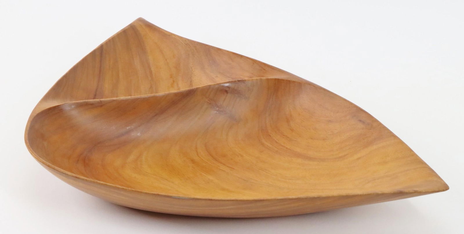 Emil Milan Wood Bowl: Carved Andaman Padauk segmented bowl in a freeform shape, signed by Emil Milan (1922 - 1985). 2.5"h x 19.5"w x 12.5"d