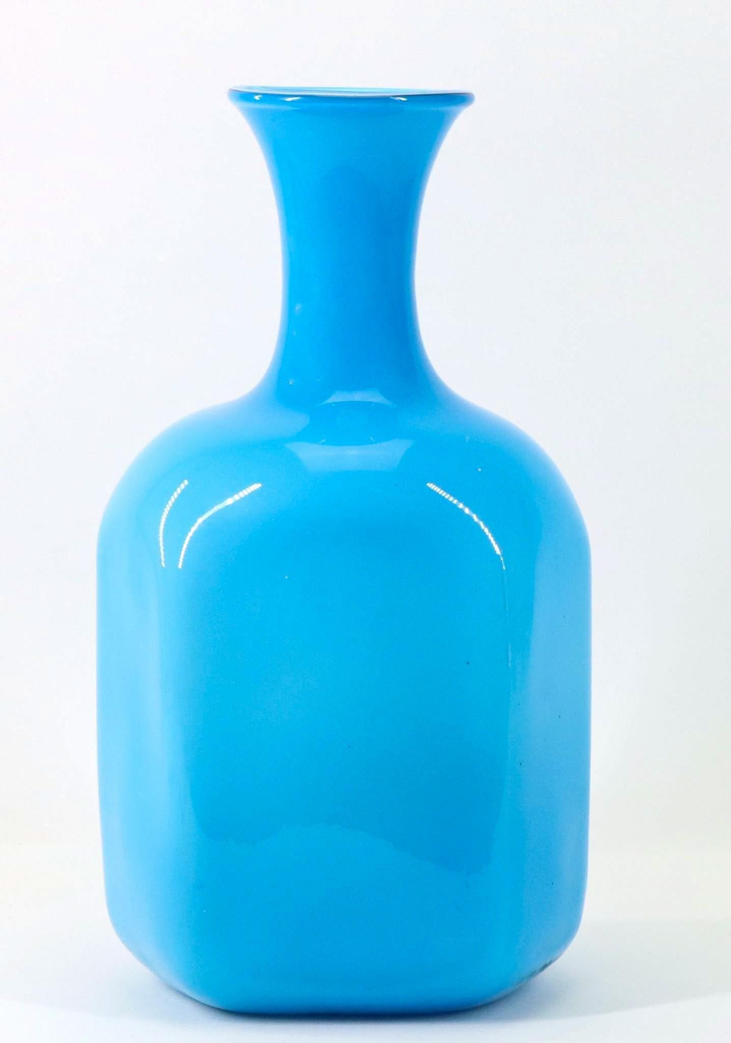 Cased Glass Bottle Vase: Manner of Holmegaard, blown glass bottle vase, robin's egg blue and opaline, unmarked. 15.75"h x 8"w x 6.5"d