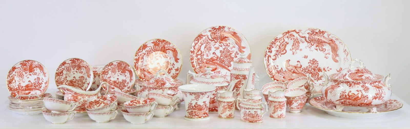 Royal Crown Derby Red Aves Porcelain Dinner Service for 8 With Extras: English bone china dinner service decorated with birds and flowers in red with gold trim, including 10.5" dinner plates (9), 8.5" salad plates (8), 6.25" bread and butter plates (8), cream soup bowls 