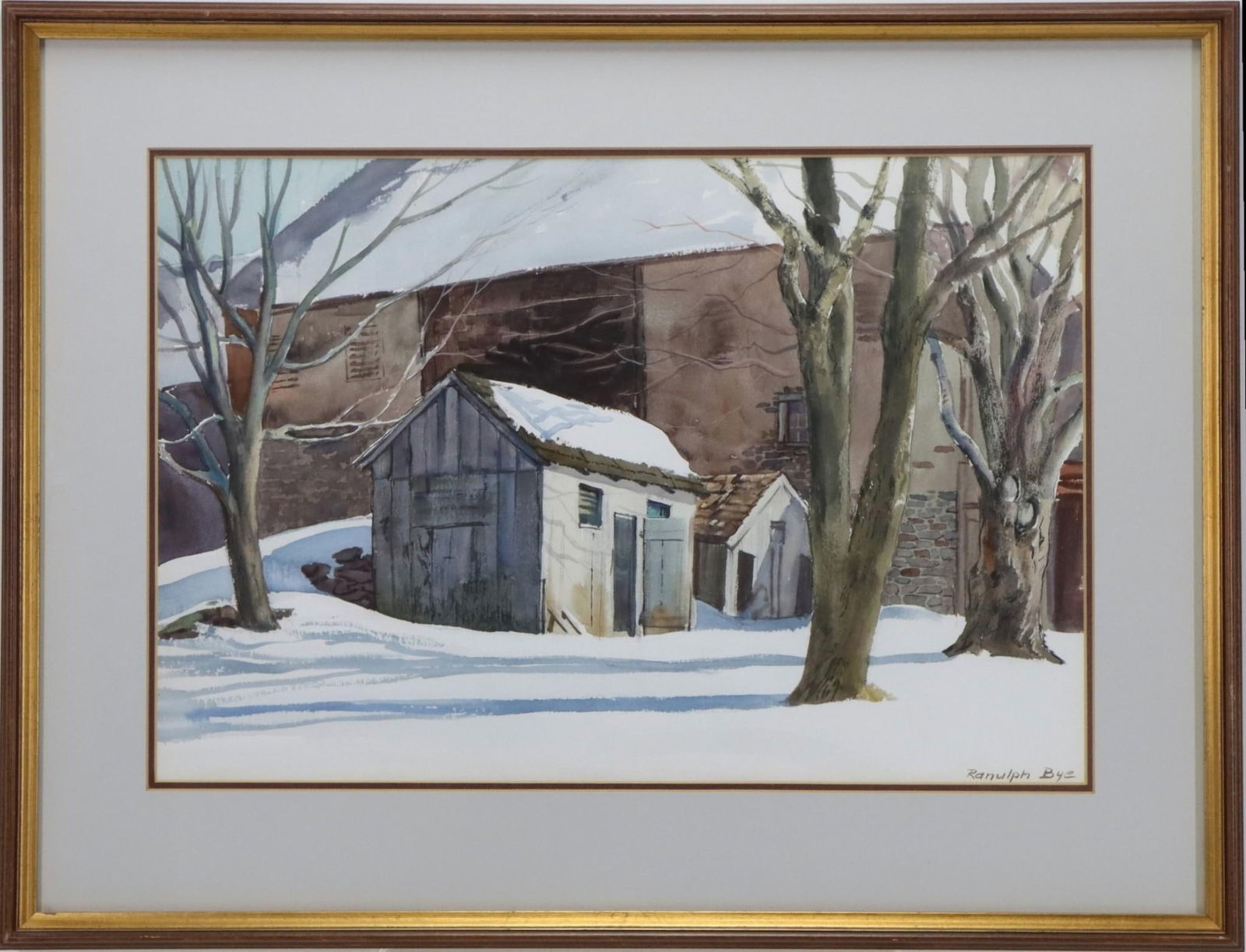 Ranulph Bye (1916 - 2003): Watercolor, "Barn in Winter", SLR. Snow-covered scene with rustic outbuildings, bare trees, and a weathered barn. 14"h x 21"w sight and 22"h x 28"w framed