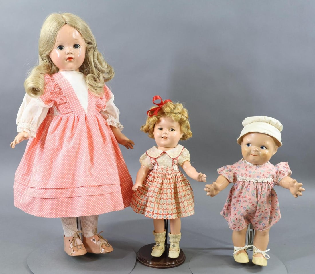 COMPOSITION DOLLS.: LOT of Museum deacession dolls. LOT of (3) dolls. 13" Unmarked 1930's CAMEO "Scootles" doll with painted side glance eyes. Romper and oilcloth shoes appear original. 13" IDEAL "Shirley Temple" doll. S