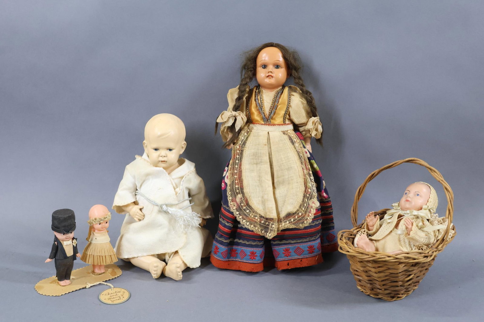 CELLULOID DOLLS.: LOT of (5) dolls. (2) Babies - 11" Unmarked (K * R 115 type) doll to look like "Little Tommy Tucker". Blue intaglio eyes, closed mouth, painted hair. 8" GERMANY 21 baby with painted features, hair. Ba