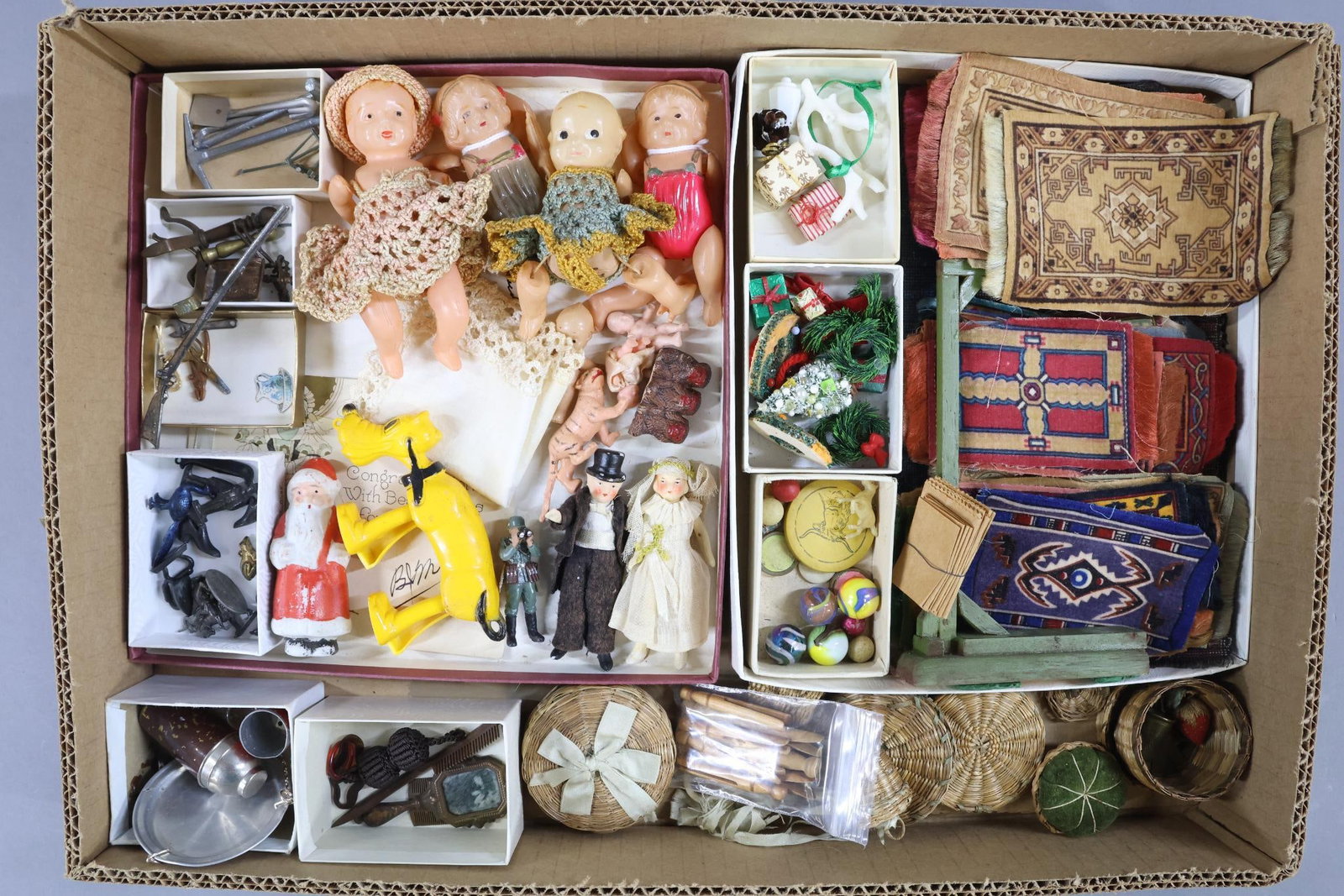 MINIATURES.: LOT of museum deaccession items. Dolls, other. Dolls - all bisque Bride and Groom. Celluloid - Kewpie, larger babies, other. Miniatures - Christmas inc. bisque Santa. Metal charms, tools, rifle, firep