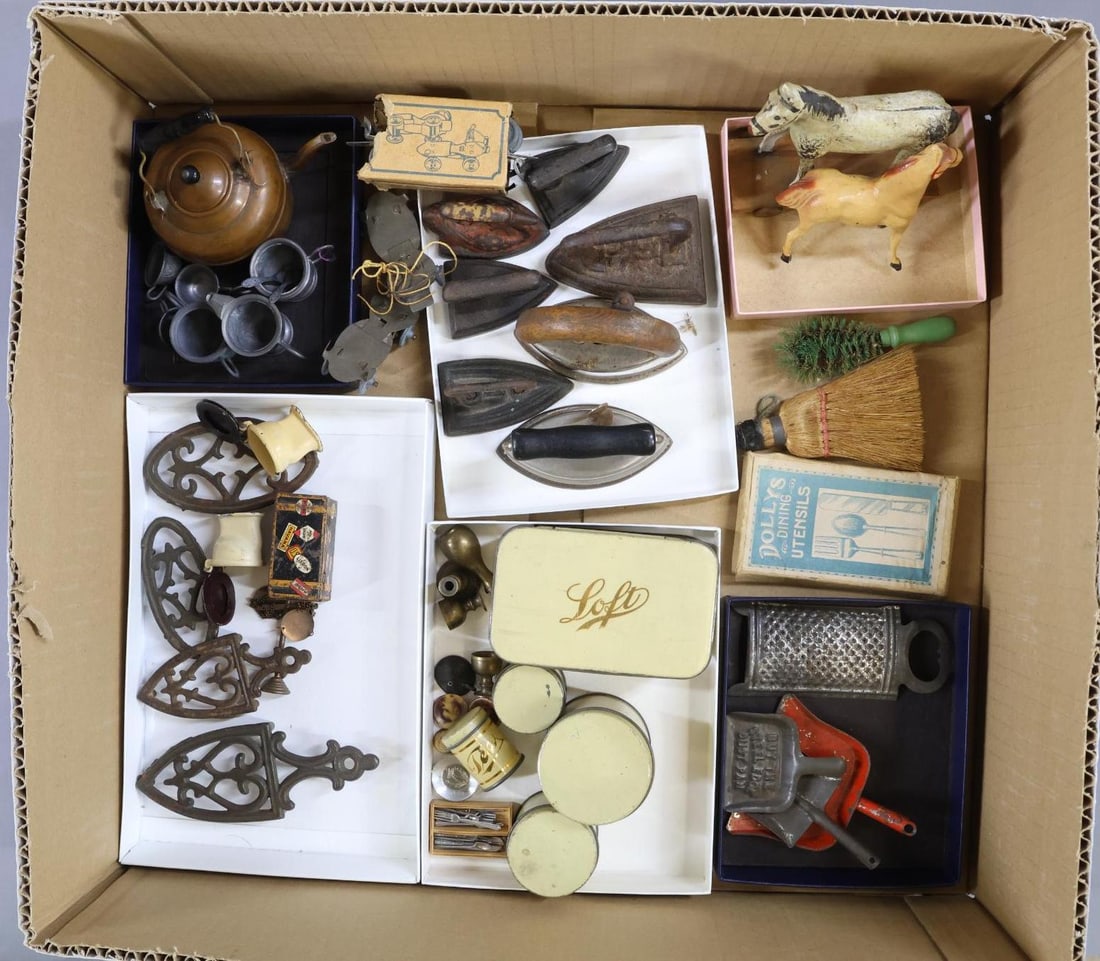 MINIATURES.: LOT of miniatures, many larger scale items. (7) Metal Irons and (4) metal trivets. 5 Pc. Tin canister set. Copper Kettle. Brushes. Metal dust pans. Doll's Dining Utensils (in OB). 2 Pc. doll's metal r