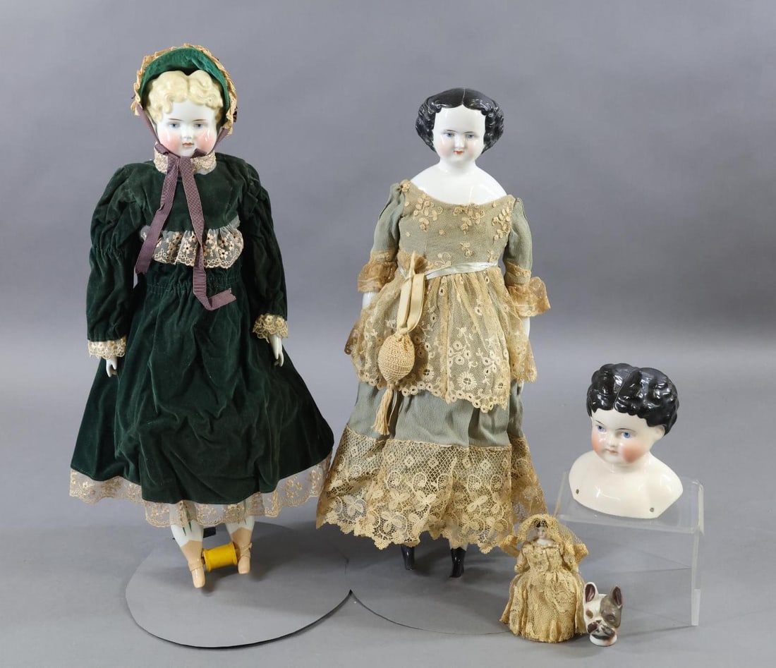 CHINA, PARIAN DOLLS.: LOT. Pair of antique China shoulder head dolls and other items. Doll 1) 17 1/2" Blonde with blue eyes, rosey cheeks. Vintage cloth body with reproduction lower china limbs. Dressed in contemporary clo