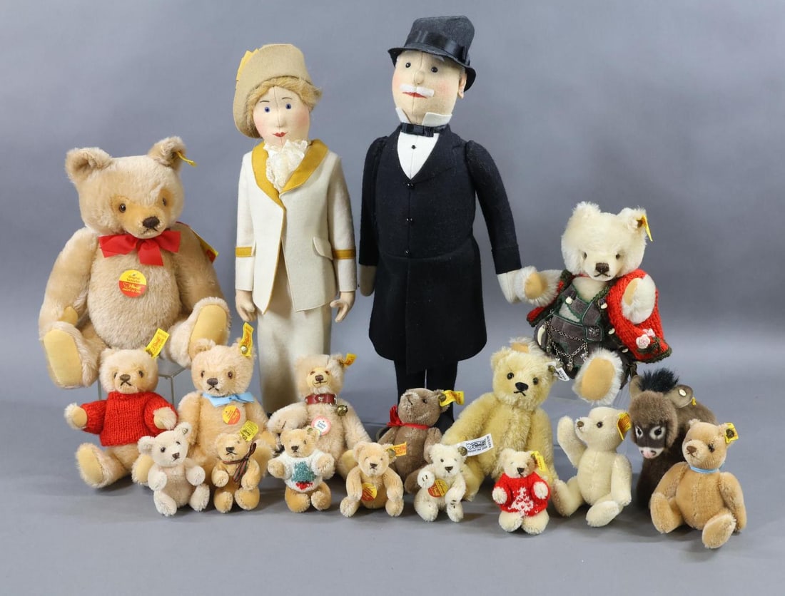 STEIFF DOLLS & MOHAIR ANIMALS.: LOT. Pair of contemporary felt dolls and (15) mohair bears. Dolls - both have brass incised buttons, white tags. 17" Female "Betty Tennisdame" 1913 Replica, 9100/45 and 18" Male "Herr in Gehrock" 1914