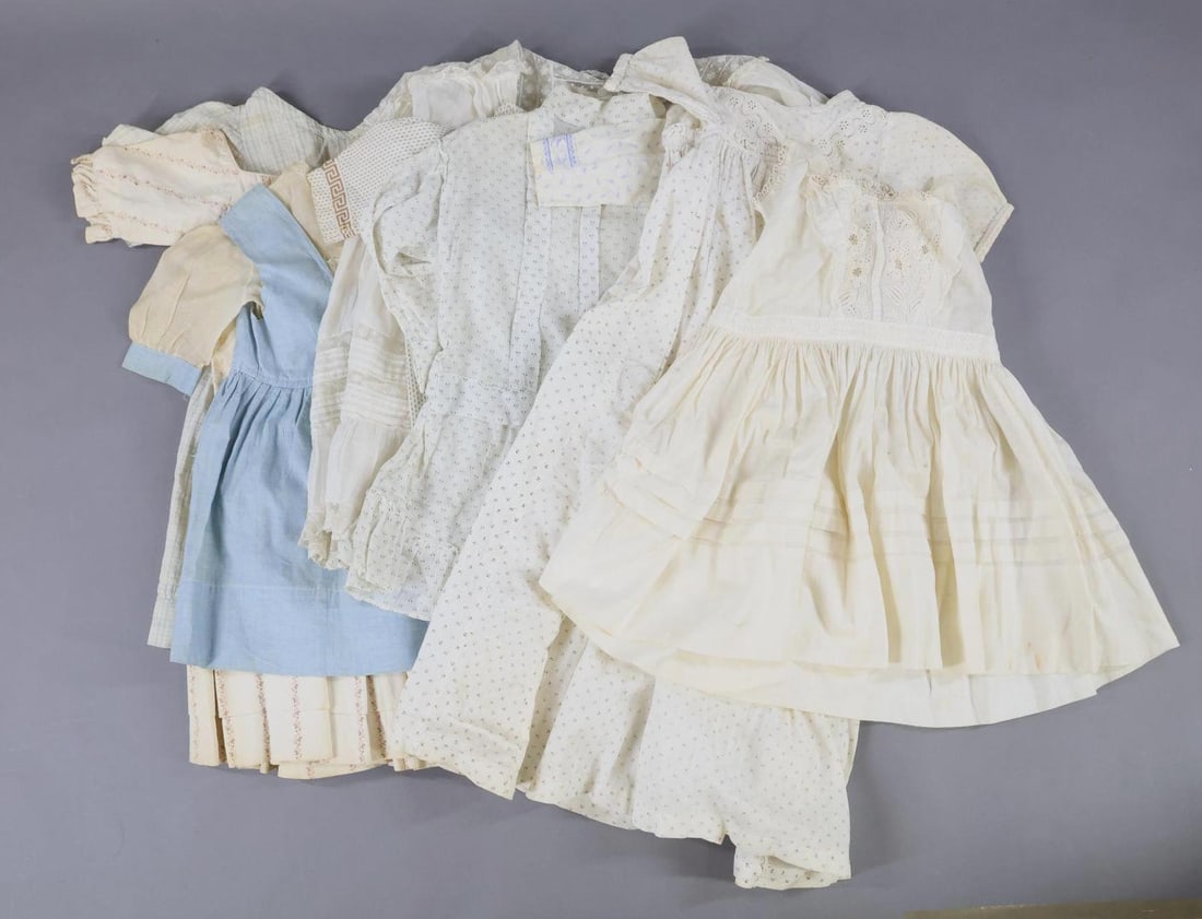 ACCESSORIES, CLOTHING: LOT of (9) antique children's pcs. of clothing. White cotton dresses, blue chambray dress, printed cotton dresses, (2) printed cotton nightgowns. Early prints from late 1800's. Condition: age discolor