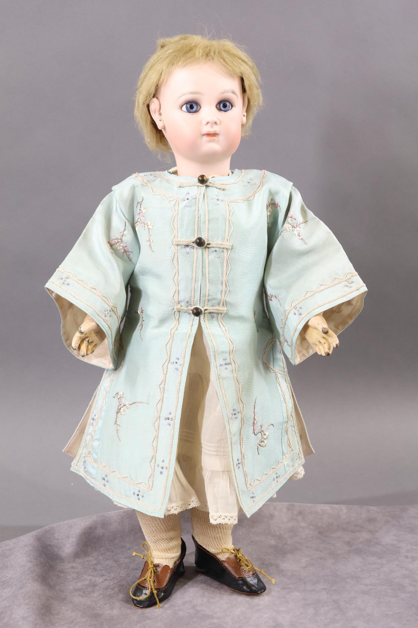 FRENCH BISQUE DOLLS.: 18" (Incised) "8". (JUMEAU) This is an original family owned doll. Blue paper weight almond shaped eyes, closed mouth, pierced applied ears. Original skin wig, cork pate. Original wooden spring in hea