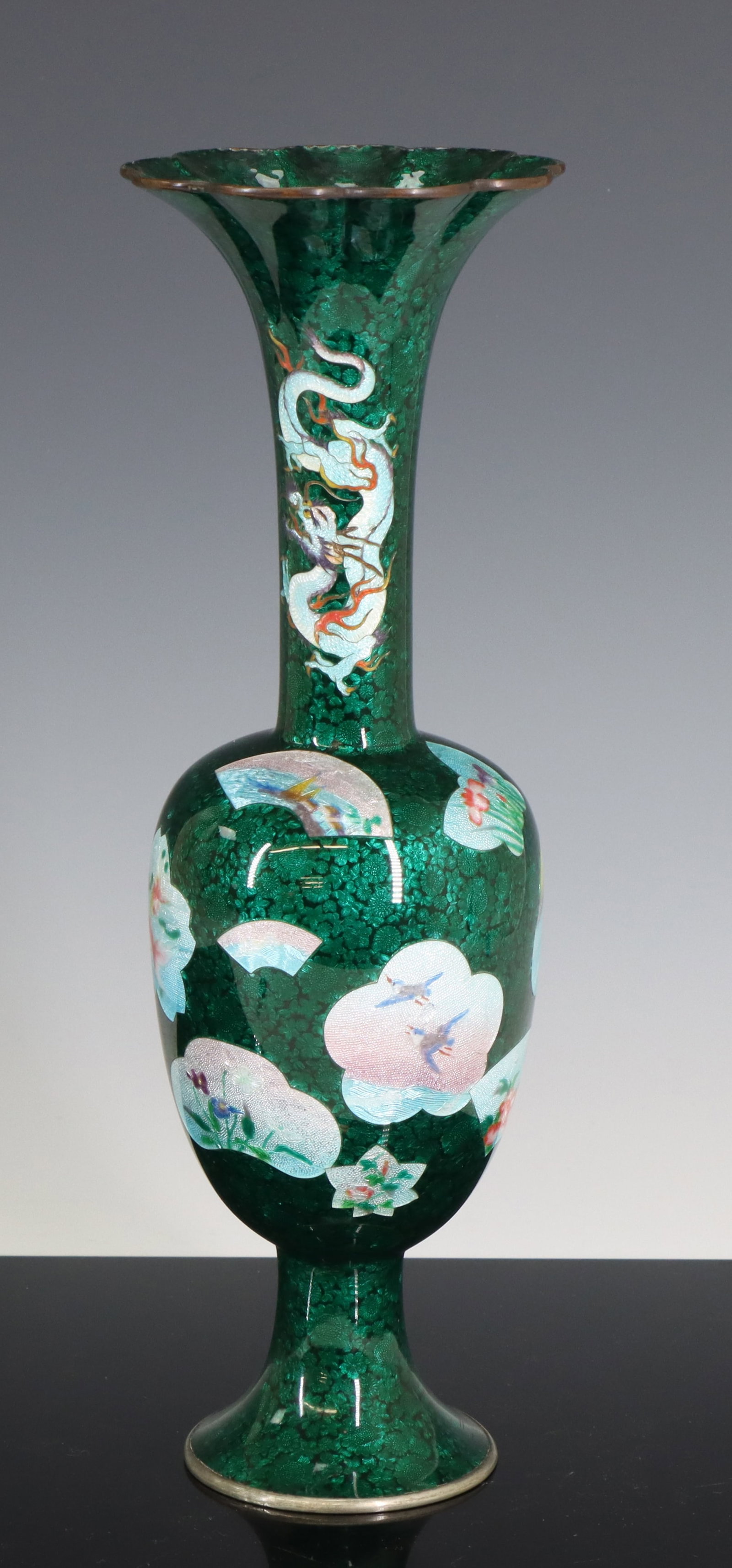 Japanese Ginbari Cloisonne Vase: Meiji - Taisho era silver wire vase with a scalloped rim, bulbous body, and flared foot, all-over ginbari decoration with dragons to the neck, and panels in various forms decorated with birds, fish, f