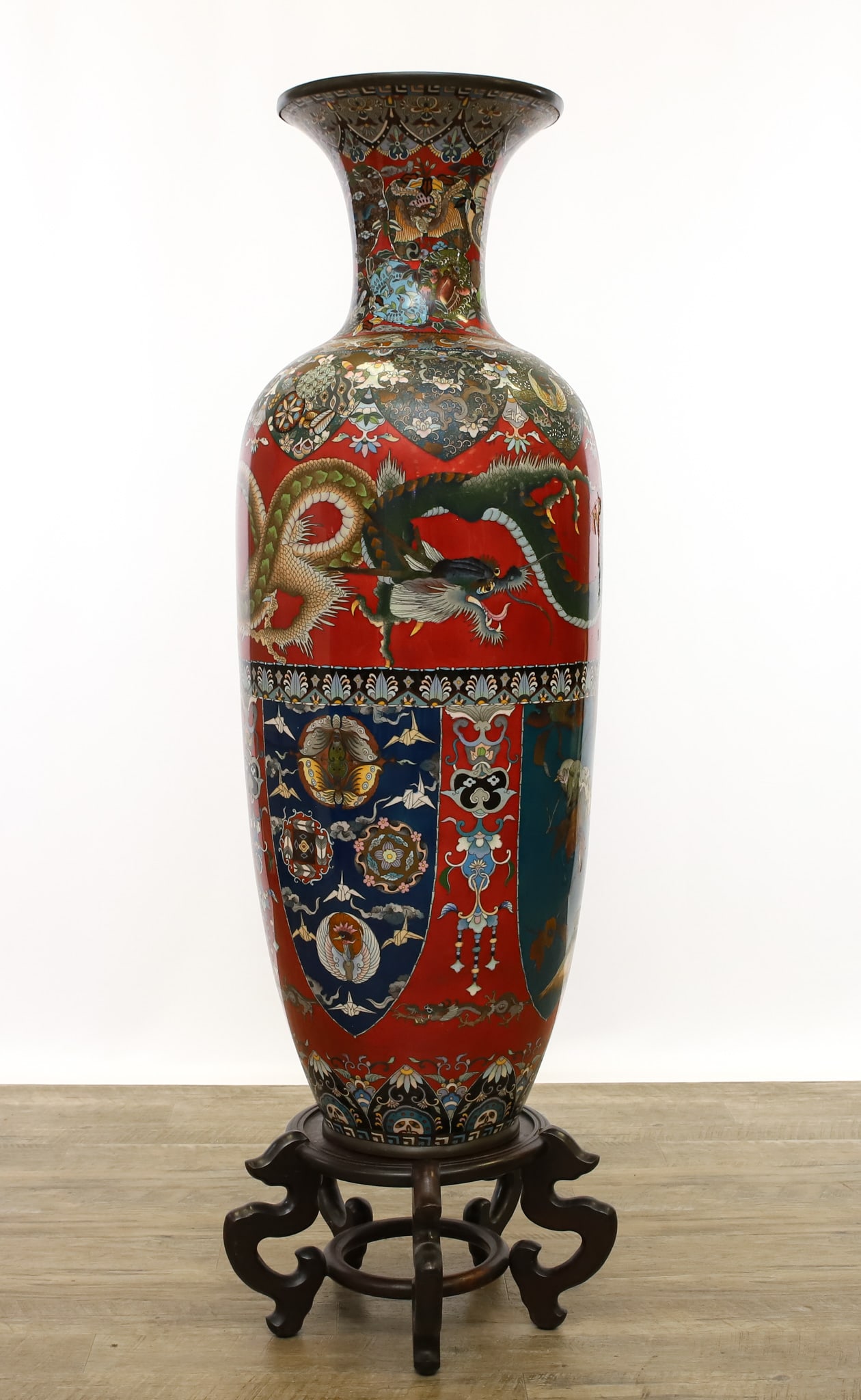 Japanese Cloisonne Palace Vase: Meiji - Taisho era cloisonne and goldstone on copper palace vase, the lower section decorated with dragons and lappets depicting auspicious beasts and objects, set among floral garlands and borders, t