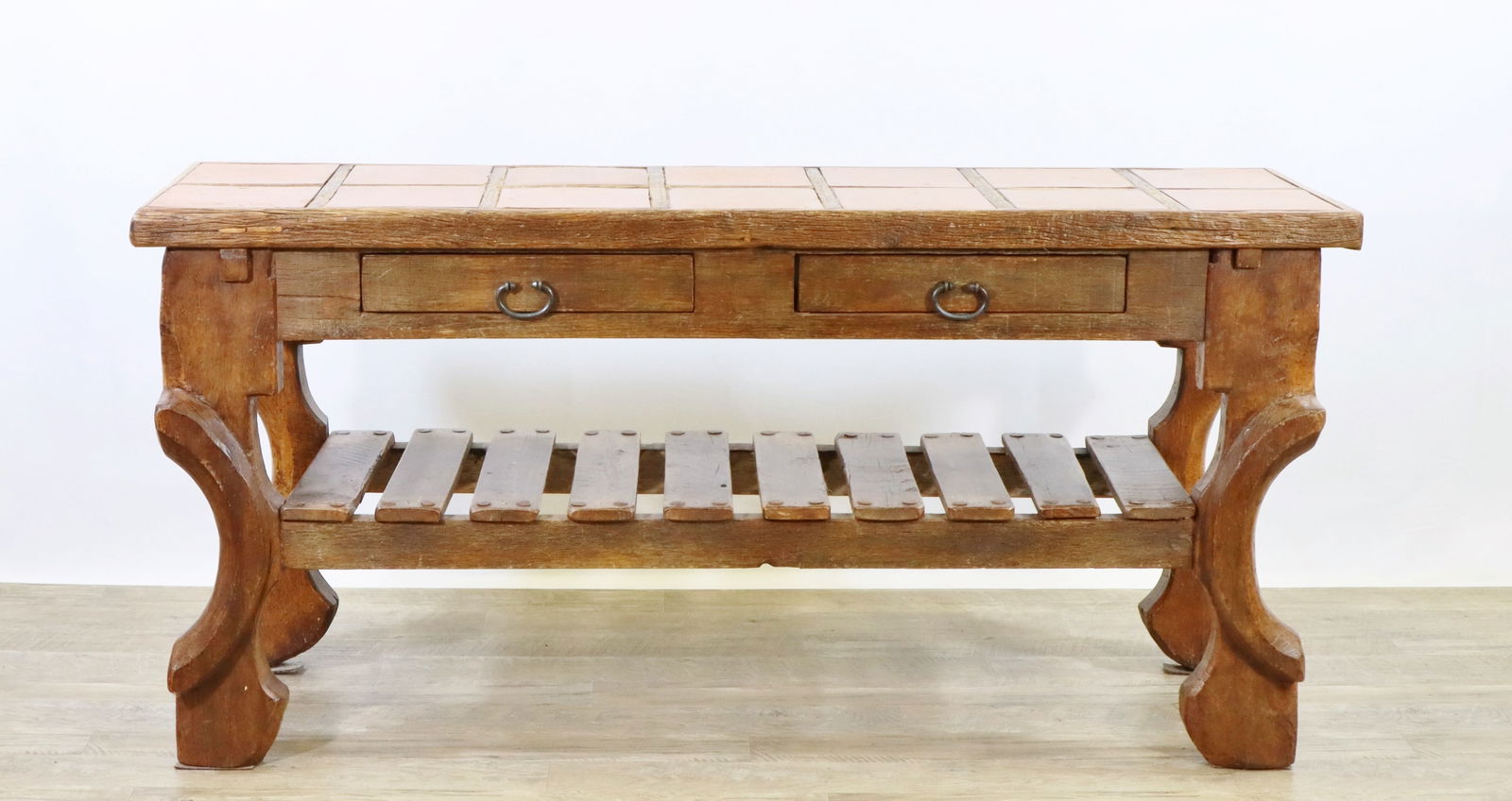 Southwestern Distressed Tile Top Hall Table: Elm, two-tier table with a square tile top, two frieze drawers, ladderback style tier, concave legs on shaped feet. 31"h x 62"w x 18"d