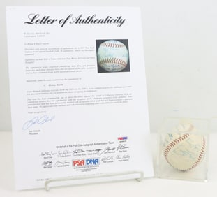 1957 Yankee Team Signed Baseball to incl Berra