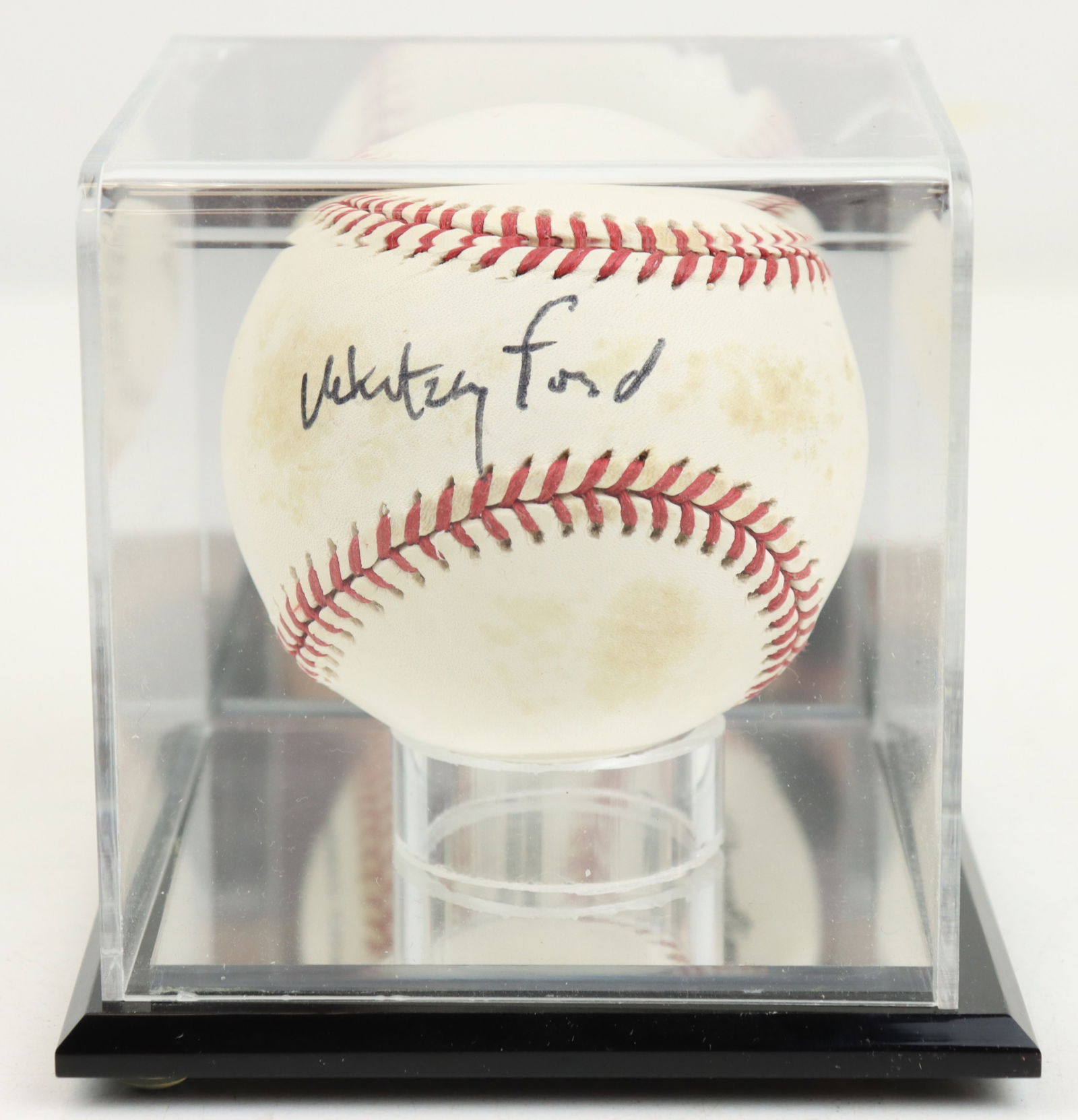 Whitey Ford Autographed Baseball: This official Rawlings National League baseball, bearing the signature of renowned pitcher Whitey Ford, showcases a piece of baseball history. Ford, known as the "Chairman of the Board," was an integr