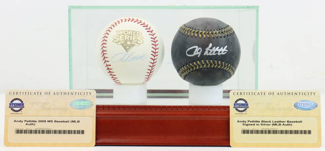 (2) Andy Pettitte Autographed Baseballs: This collection features two autographed baseballs by pitcher Andy Pettitte, carefully preserved in a mahogany and glass display case 5.25"h x 4.75"w x 8"d. The first is an official black leather MLB