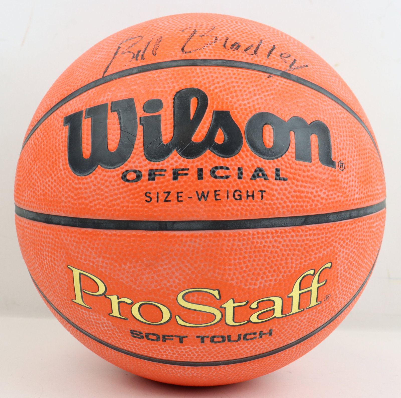 Bill Bradley Autographed Basketball: This is a Wilson official basketball, personally autographed by Bill Bradley, the legendary basketball player who transitioned into a celebrated political career. Known for his time in the NBA with th