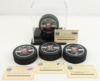 (4) Autographed NY Islander Hockey Pucks