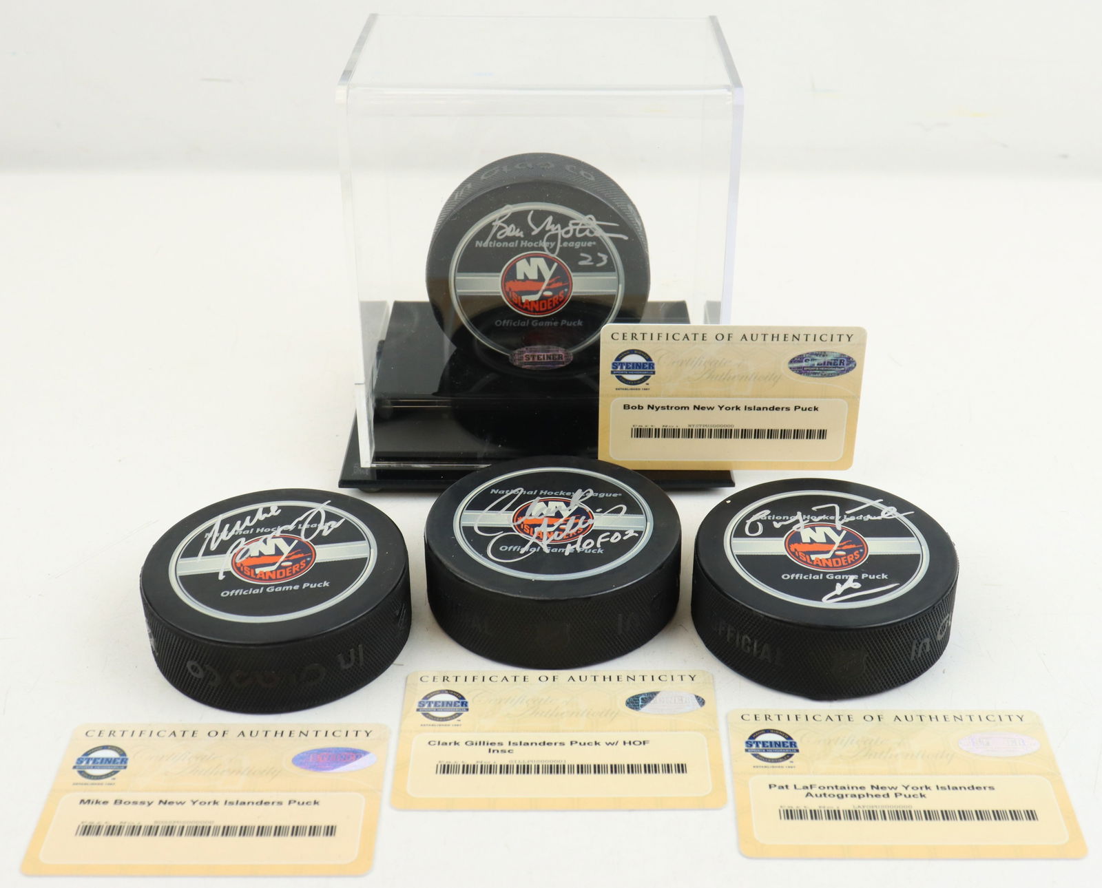 (4) Autographed NY Islander Hockey Pucks (1 of 16)