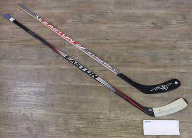 Gaborik Autographed & Nash Used Hockey Sticks