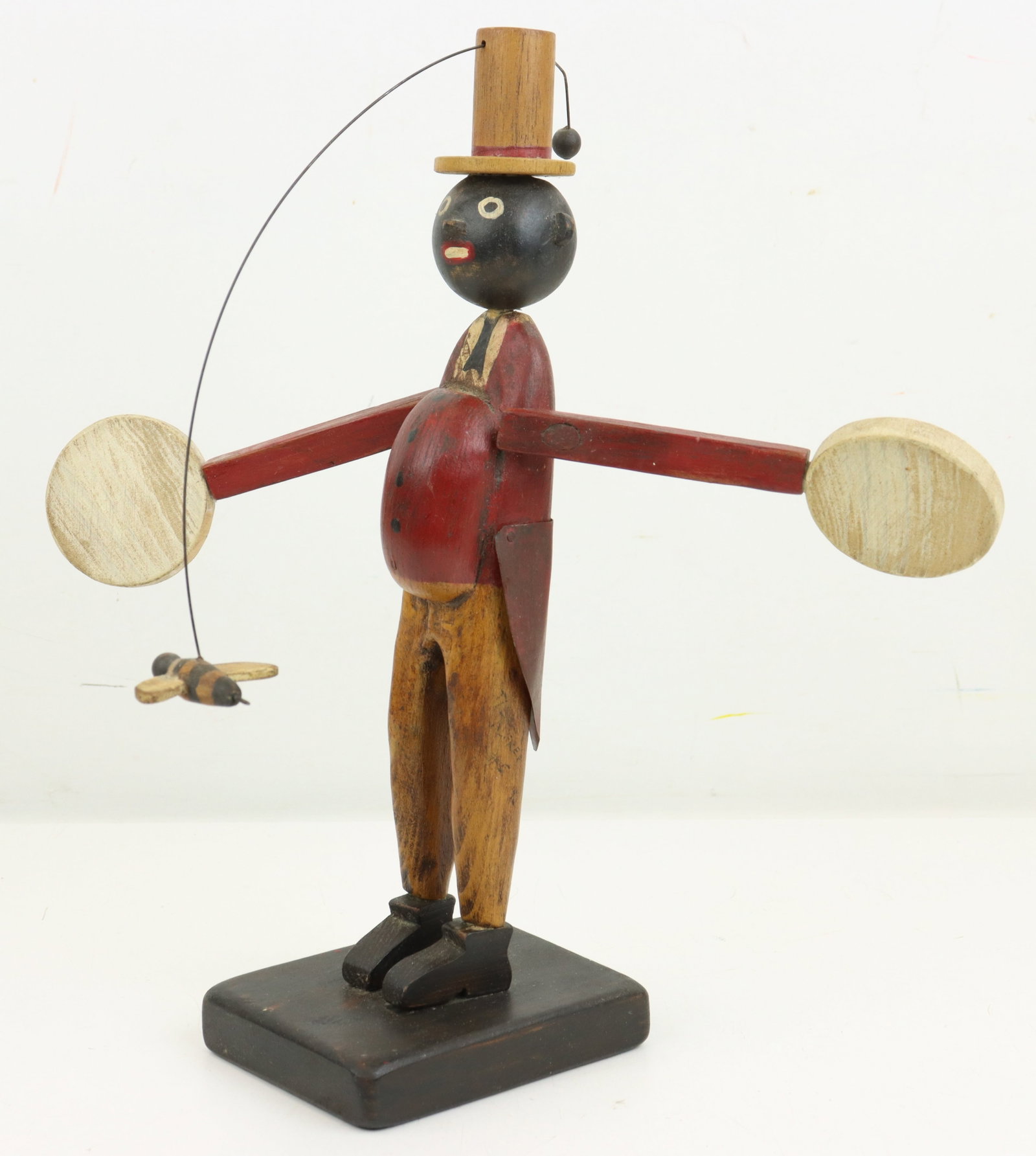 Black Americana Whirligig: Handmade wood, metal and wire, Black Americana whirigig, figure swatting a bee. 11.25”h x 10.75”w x 8”d